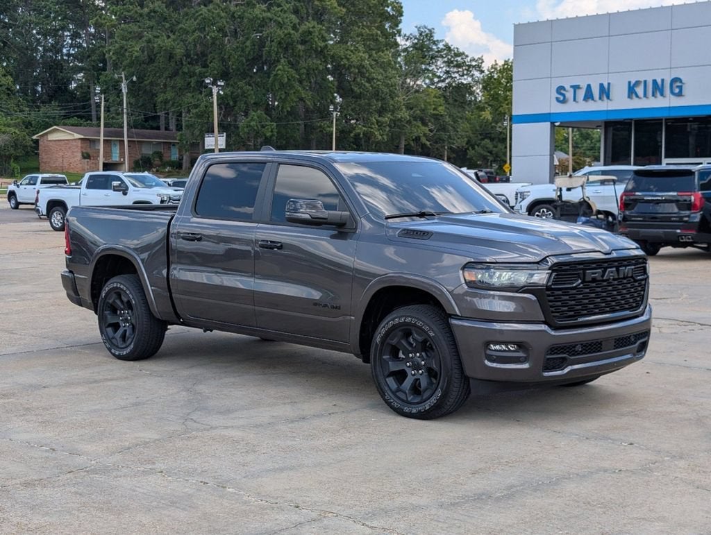 2026 RAM 1500 Big Horn in Granite Crystal Metallic Clearcoat — front three-quarter view