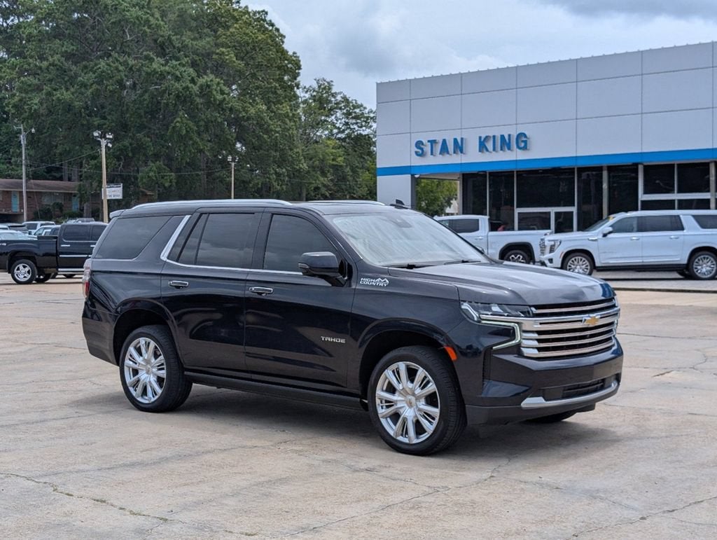 2023 Chevrolet Tahoe High Country in Midnight Blue Metallic — front three-quarter view