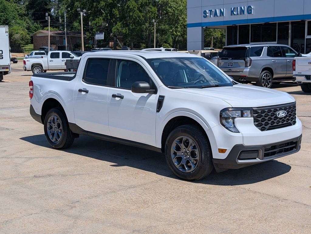 2025 Ford Maverick XLT in Oxford White — front three-quarter view