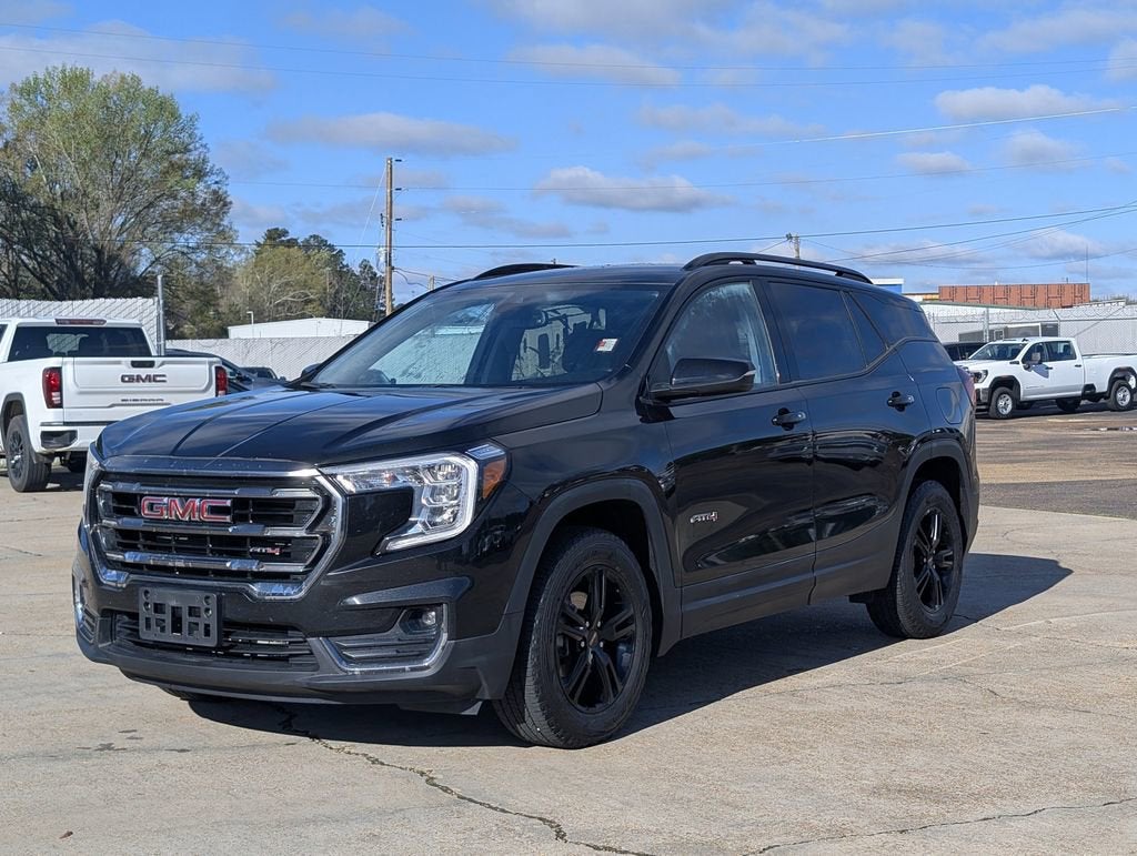 2023 GMC Terrain AT4 in Ebony Twilight Metallic — front three-quarter view